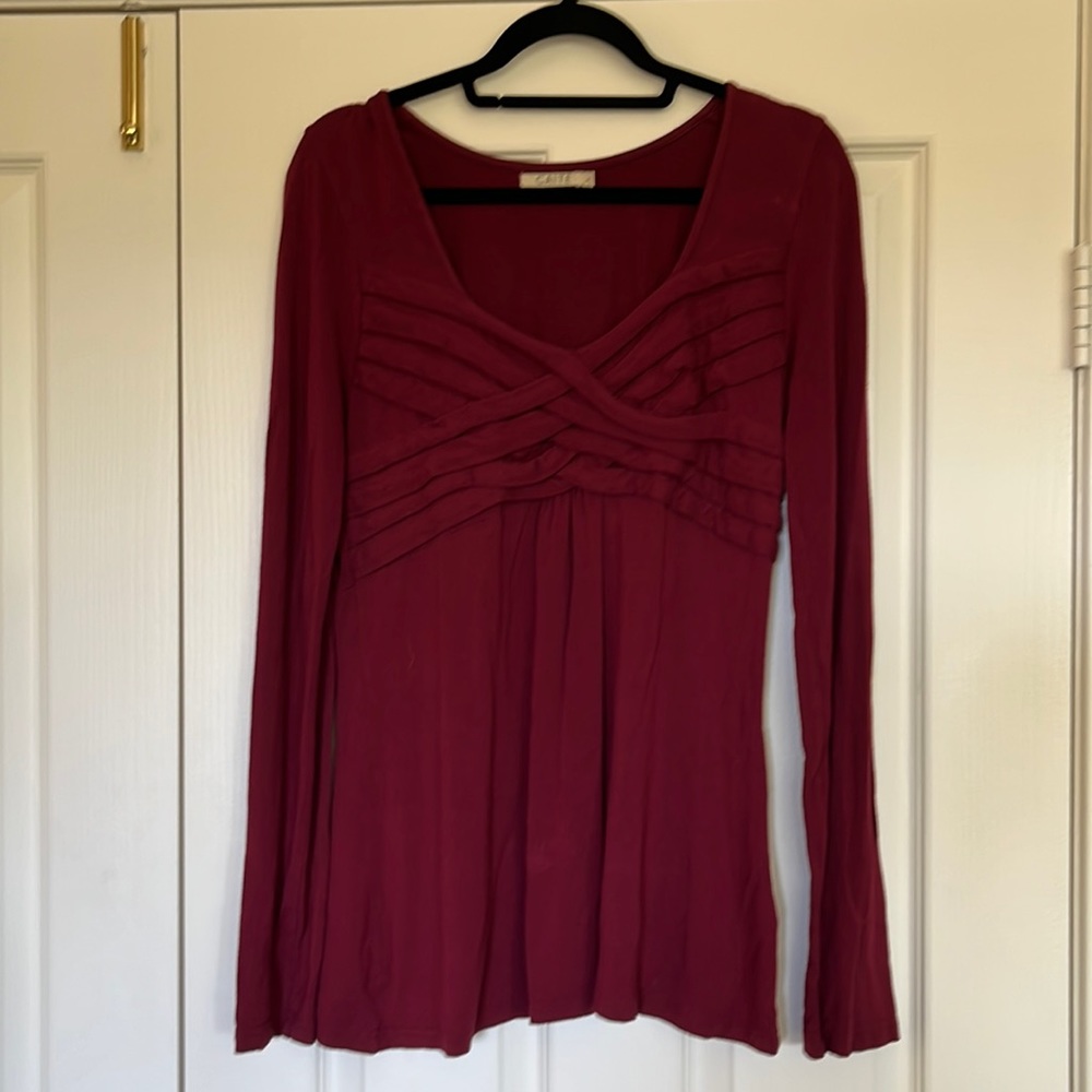 Beautiful burgundy tunic with unusual detail in front never worn